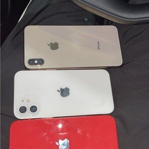 Apple iPhone in Gold, White, and Red